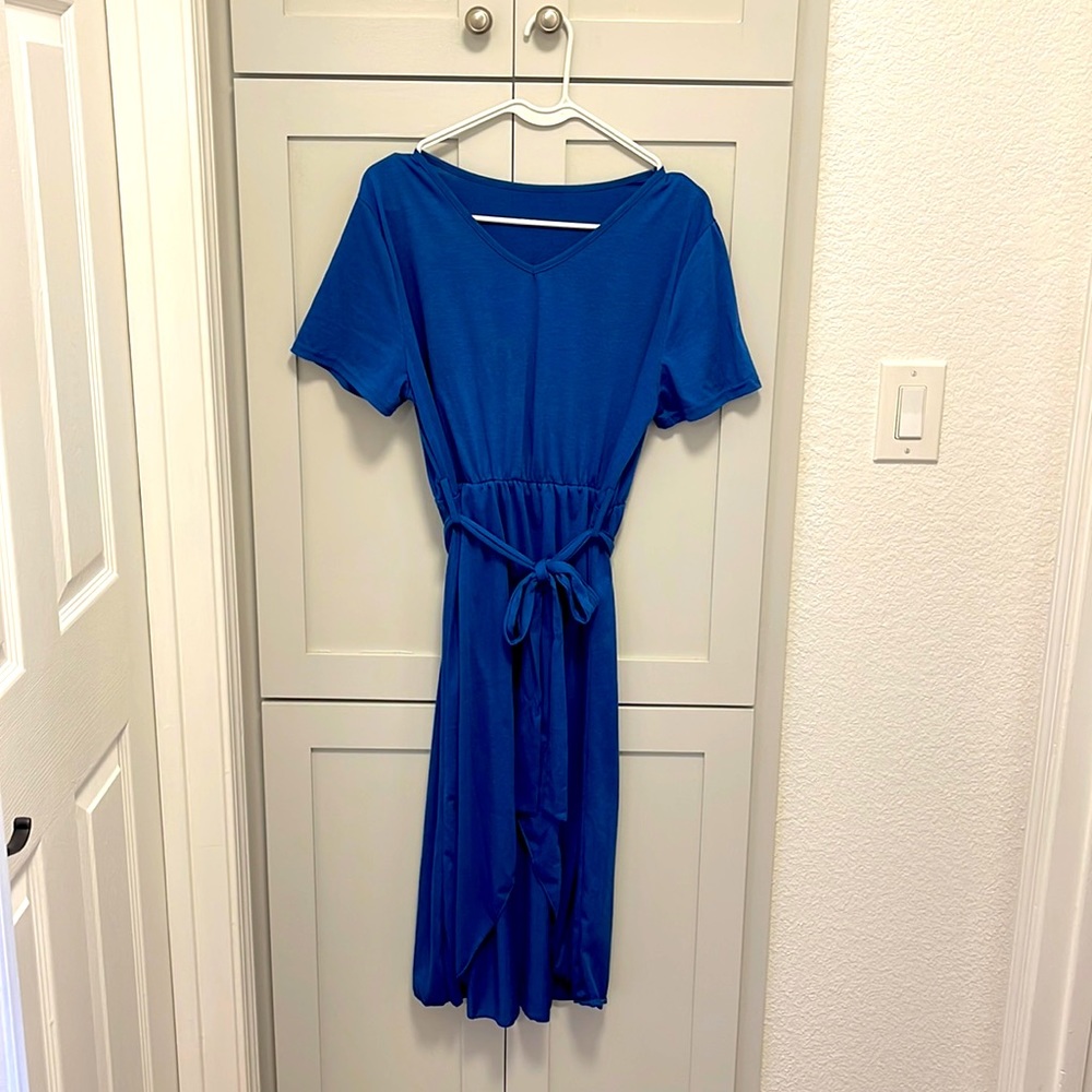 It is a cute wrap ham belted dress